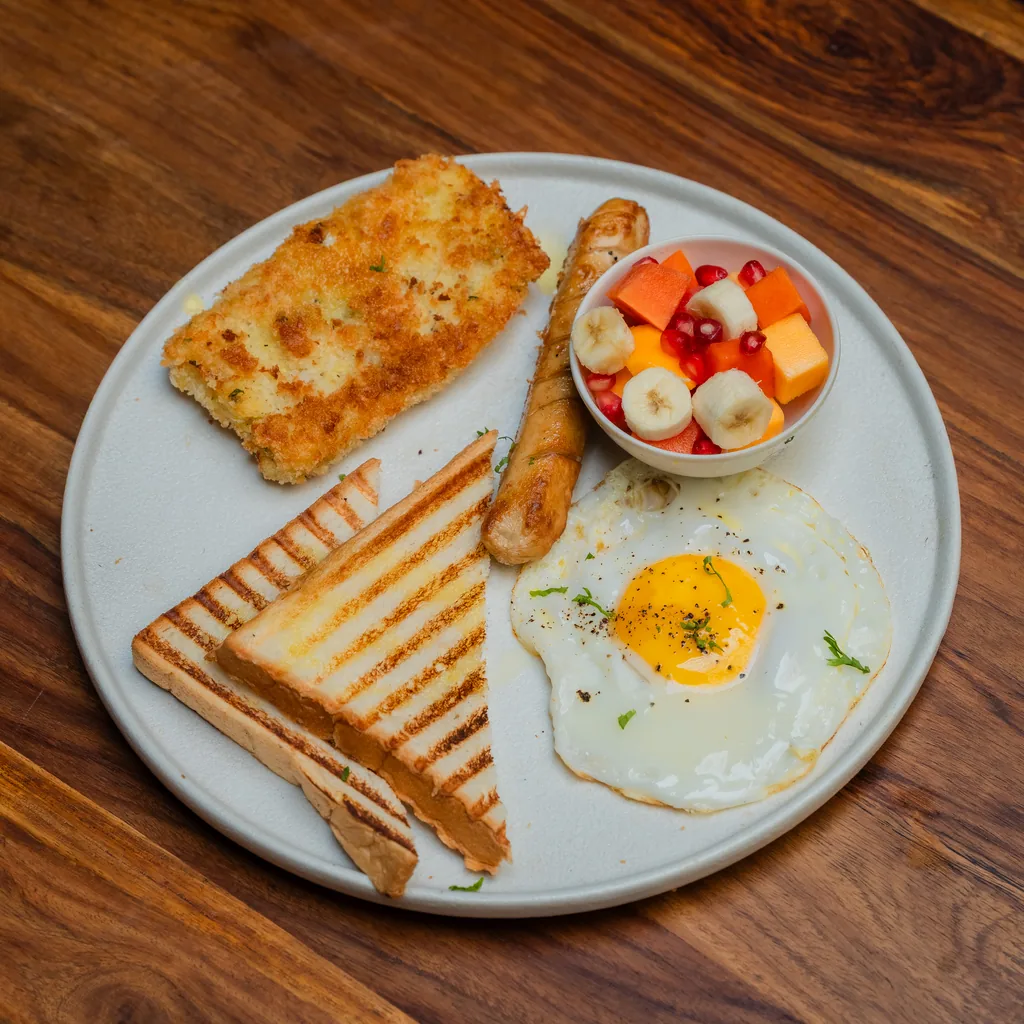 The Junior breakfast plate with toast, egg, fruit and grilled bread